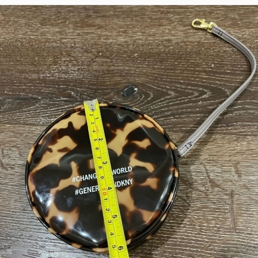 DKNY save the turtle wristlet in excellent condition